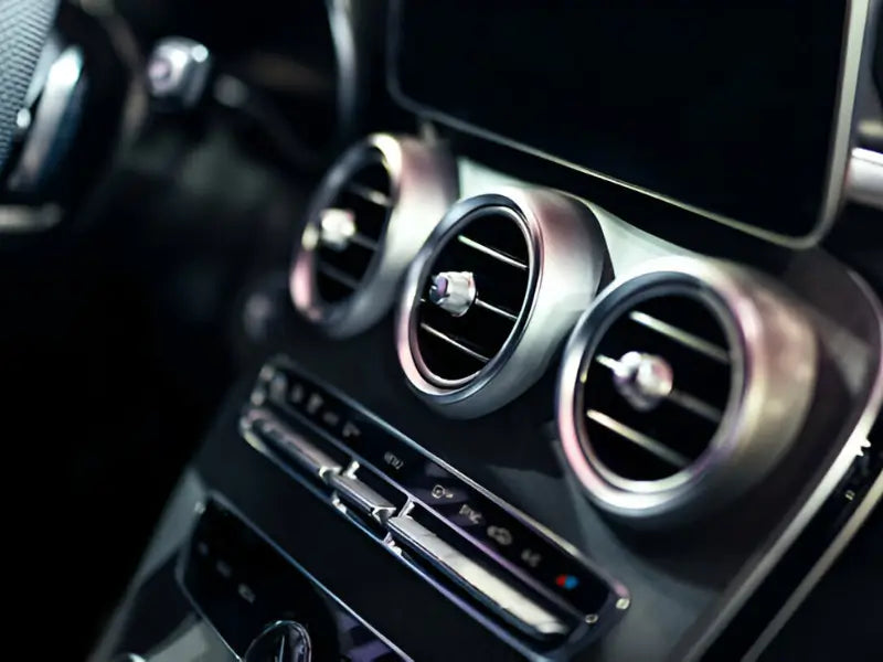 A close-up of a car air duct component, representing load-bearing prototypes made using SLS or CNC machining.